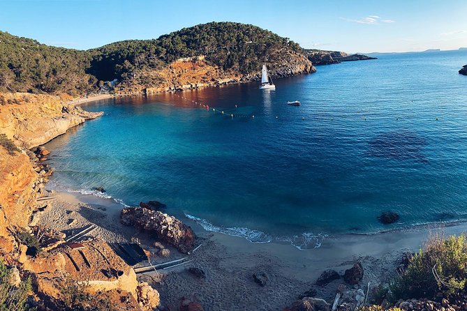 Discover Cala Bassa and Cala Comte on board a catamaran - Starting in Sant Antoni at Carrer del General Balanzat