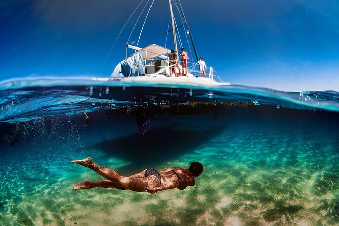 Discover Isla Mujeres: Catamaran, Snorkeling, and "Ice Bar" - Leaving Cancún and settling into the boat