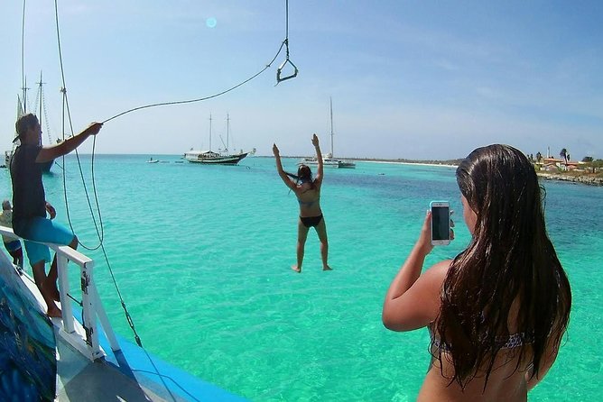 Dolphin Catamaran Snorkel and Sail with Open Bar - Food, drinks, music, and the social mood
