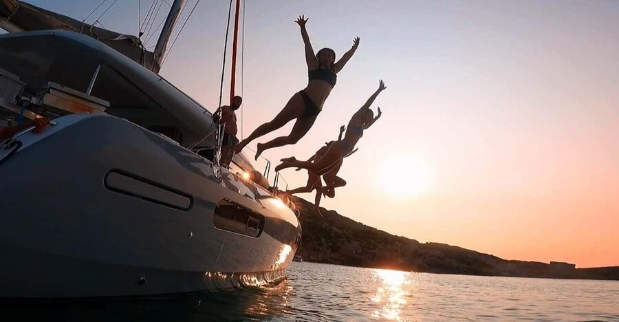 Evening Catamaran Charter - Swimming, snorkeling, and paddleboarding before sunset