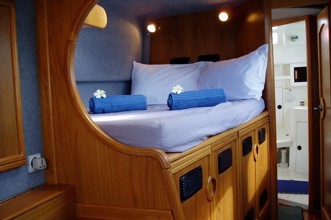 Exclusive private catamaran island hopping experience - Beach time, a walk, and lunch at your own cost
