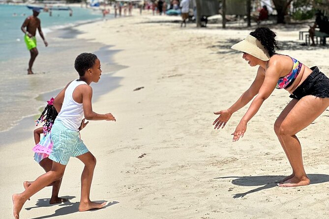 Family Catamaran Cruise from Jamwest Beach Negril Hotels - Sailing the Negril coast with drinks and music