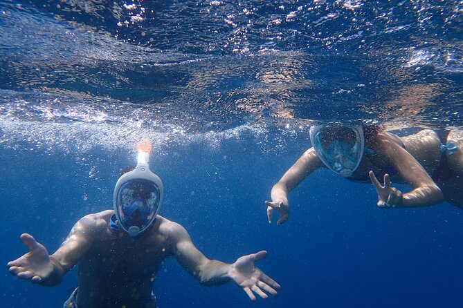 Formentera Catamaran Trip with Water Sports, Paella & Open bar - What the $204.50 group price really means