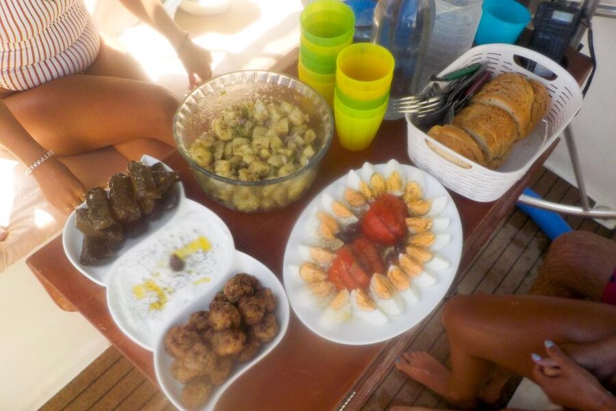 From Adamas: Milos and Poliegos Catamaran Cruise with Lunch - Gerakas, Tsigrado, and the southern coast
