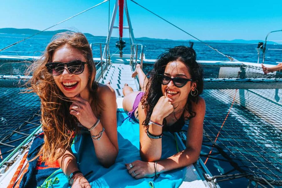 From Brač Island: Catamaran Tour with Food & Drinks - The boat atmosphere and who will enjoy it