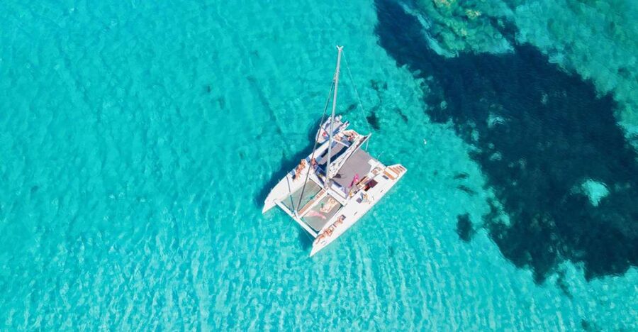 From Cannigione: Catamaran tour among La Maddalena islands - Budelli, Santa Maria, Razzoli, and Caprera