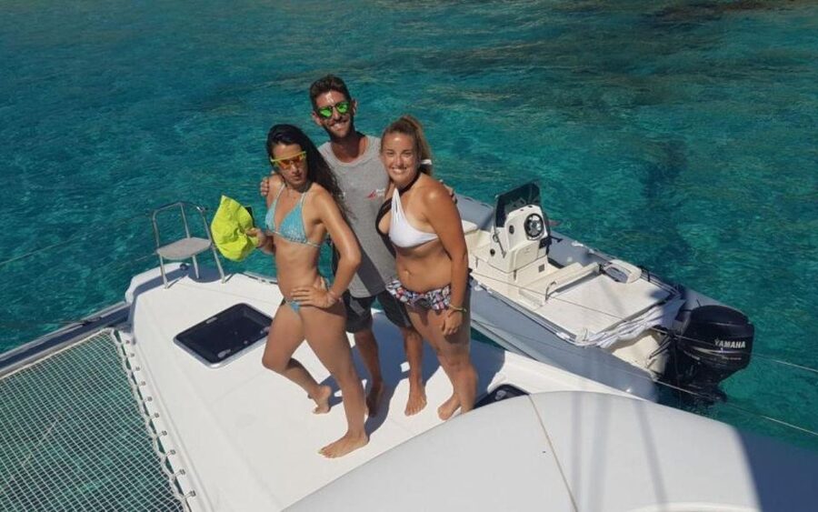 From Cannigione: Catamaran tour among La Maddalena islands - Lunch with local fish and Sardinian flavors