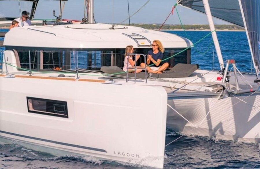 From Cannigione: Catamaran tour in La Maddalena Archipelago - Swimming, snorkeling, and tender rides