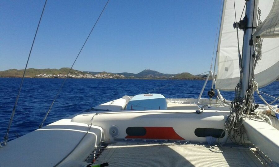 From Fornells: Half-Day Menorca Catamaran Trip w/ Snorkeling - Sailing past the northern marine reserve