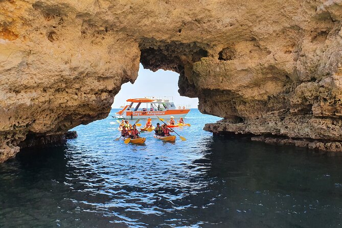 From Lagos: Kayak Tour of Ponta da Piedade Caves on Catamaran - Paddling through the caves and cliffs