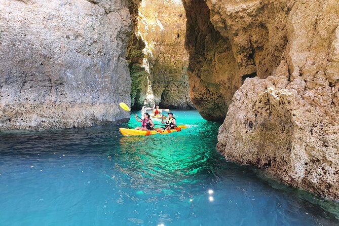 From Lagos: Kayak Tour of Ponta da Piedade Caves on Catamaran - Learning to paddle before the caves
