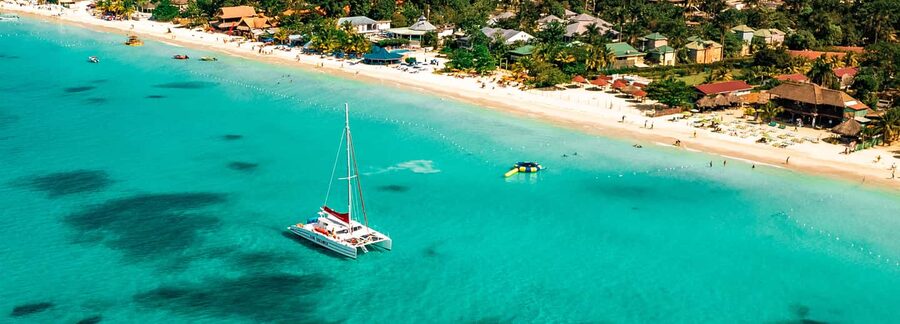 From Montego Bay/Falmouth: Negril Beach Catamaran Cruise - Seven Mile Beach, where the day opens up