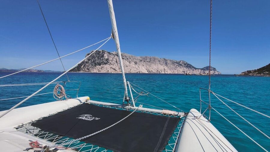 From Olbia: Tavolara or Cala Moresca Catamaran Tour - Tavolara route: rocky views and white coves