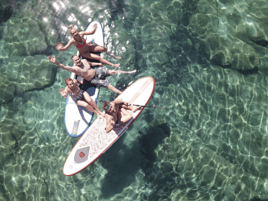 From Ornos: Mykonos Delos Catamaran Cruise with Meal & SUP - Passing Delos without going ashore
