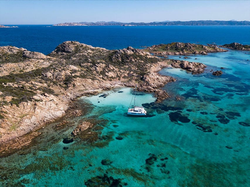 From Palau: La Maddalena Archipelago Catamaran Tour w/ Lunch - Three swim stops in clear Sardinian water