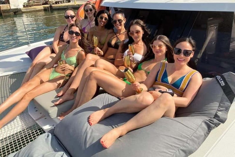 From Palma: Luxury Catamaran Group Tour with Tapas & Drinks - The bay stop: swimming, snorkeling, and SUP time