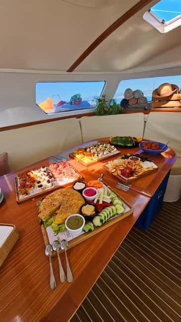 From Palma: Luxury Catamaran Group Tour with Tapas & Drinks - Comfort, weather, and what to pack