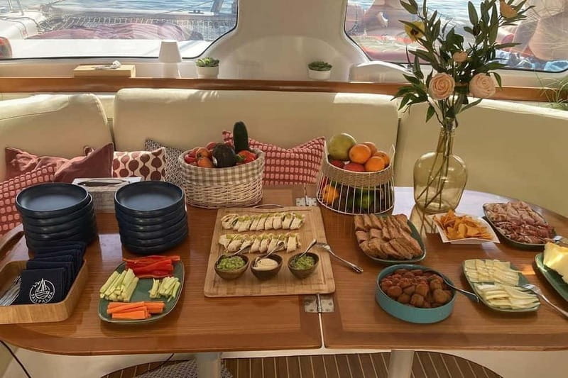 From Palma: Luxury Catamaran Group Tour with Tapas & Drinks - Four hours of sailing along the Mallorca coast