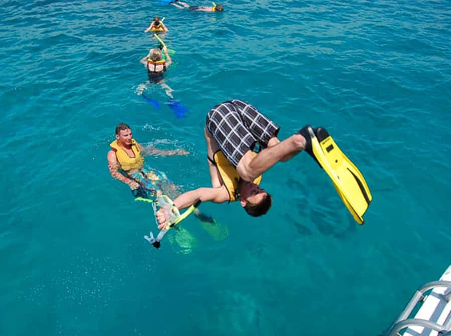 From Puerto Aventuras: Share Catamaran Tour - Lunch from the onboard grill
