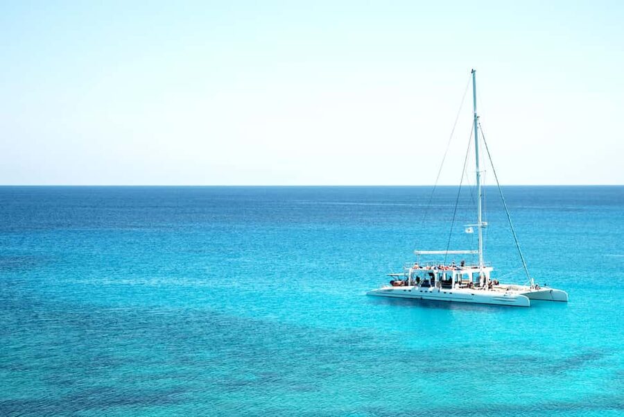 From Punta Cana: Catamaran Tour to Saona Island with Open Bar and Buffet - What the Day Feels Like