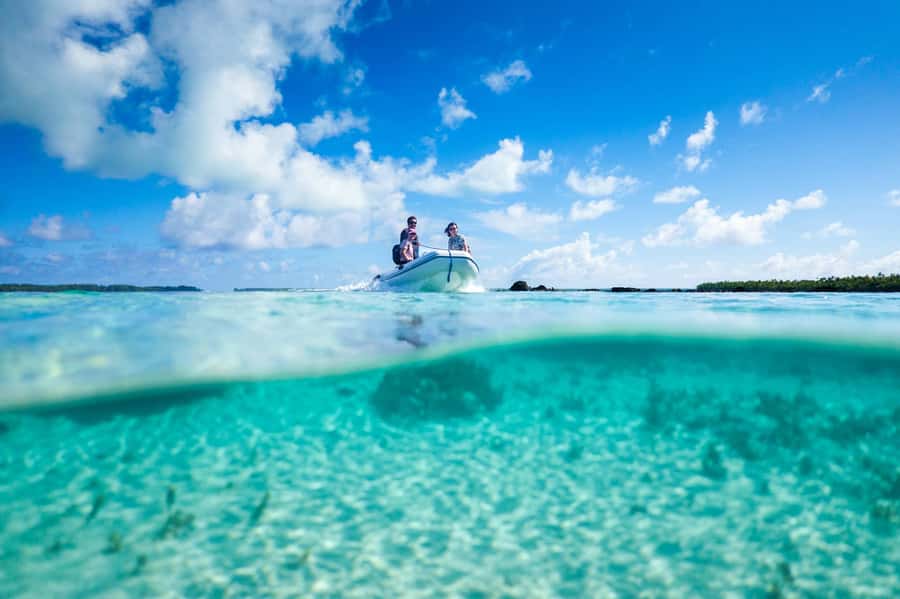 From Tahiti: Tetiaroa Island Tour by Sailing Catamaran - Landing by dinghy and walking toward Bird’s Island