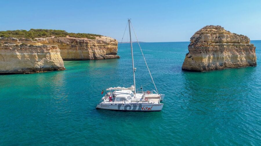 From Vilamoura: Sunset Catamaran Experience - Along the Algarve coast toward the caves