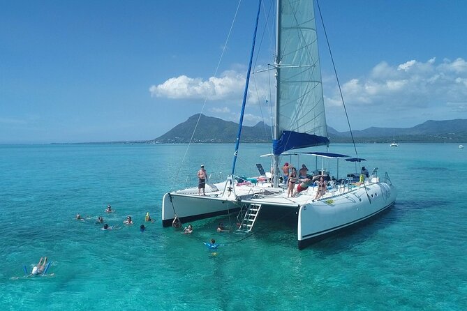 Full Day Catamaran Cruise on shared basis to Bénitiers Island - Tamarin Bay and the uncertain search for dolphins