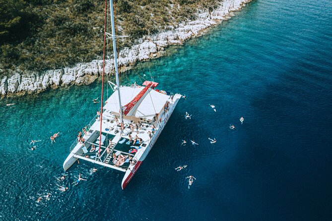 Full-Day Catamaran Cruise to Hvar & Pakleni Islands with Food and free Drinks - Food, drinks, and what the price really covers