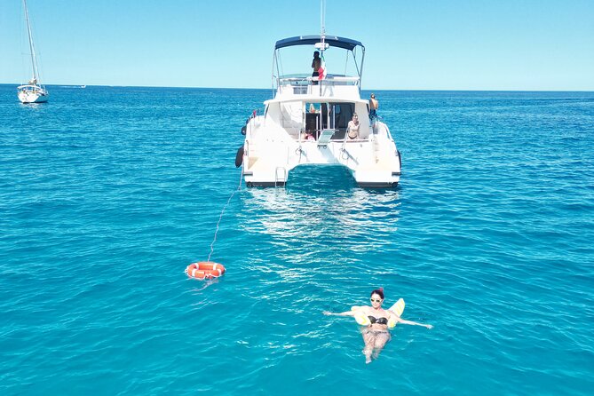 Full-day catamaran tour in Palermo: boat experience with lunch - Capo Gallo and the rocky coast