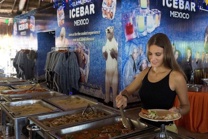 Full-Day Catamaran Tour to Isla Mujeres from Cancun with Lunch - Isla Mujeres, lunch, and beach-club time