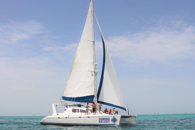 Full-Day Luxurious Catamaran Adventure - Cancún to Isla Mujeres - Sailing from Puerto Juarez on a social catamaran