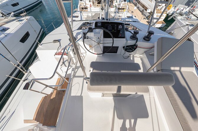 Full-Day Private Tour in Santorini by Luxury Catamaran - Sulfur-colored water at Nea Kameni and Palea Kameni