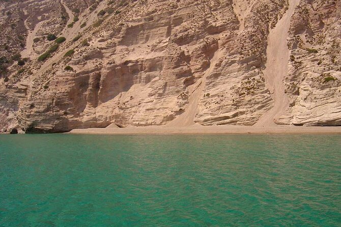 Full Day Tour to Kleftiko, Firlingos and Poliegos Catamaran - Cape Vani and the red cliffs of the old mine