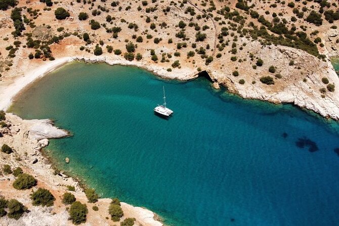 Full Day Yacht Tour in Catamaran Naxos Greece - Meeting point, timing, and cancellation