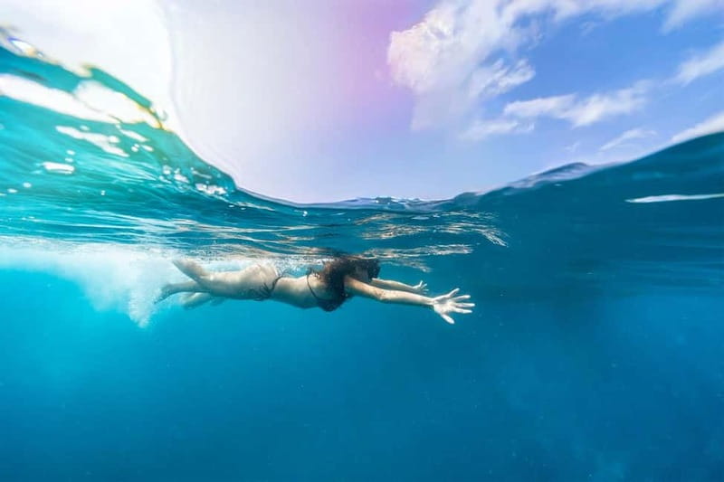 Gran Canaria: Catamaran Tour with Lunch on Pristine Beaches - What the four-hour rhythm feels like