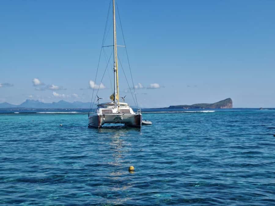 Grand Bay: Catamaran Cruise to Flat Island with BBQ Lunch - Sailing north from Grand Baie to Flat Island