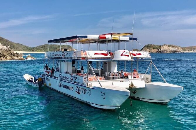 Guided Tours of the 7 Bays of Huatulco Oaxaca in Catamaran - What this Huatulco catamaran day is really like