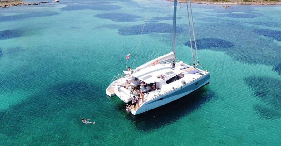 Gulf of Asinara: Full day catamaran excursion with lunch - Setting out from Stintino on Pittolo
