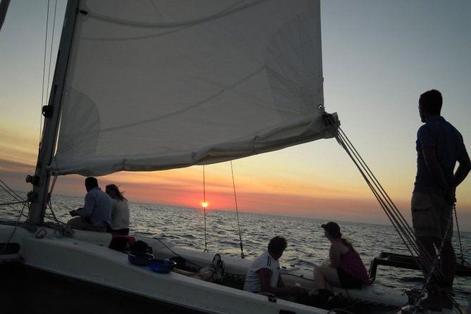 Half-Day Catamaran Trip in Menorca - Timing, weather, and booking details
