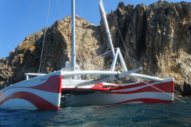 Half-Day Catamaran Trip in Menorca - Cala stops, swimming, and snorkeling