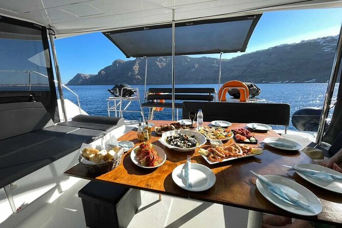 Half Day Premium Catamaran Cruise in Santorini including Oia - A catamaran view of Santorini’s caldera