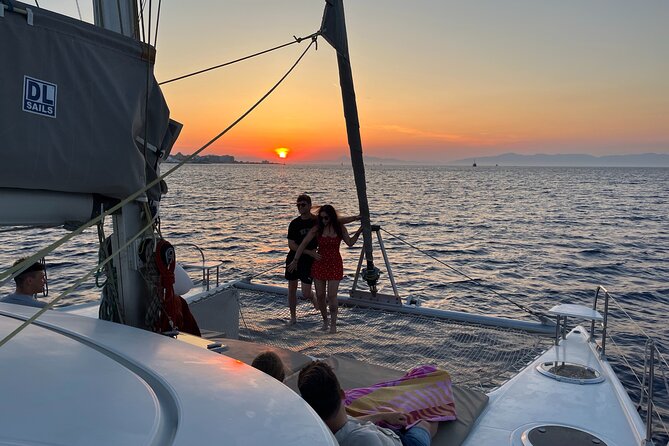 Half Day Sailing Catamaran with Sunset Experience - A sunset cruise built around two good stops