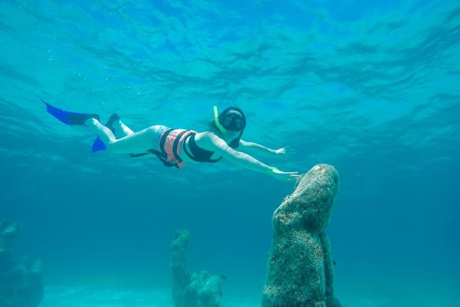 Half Day Sailing Private Catamaran to Isla Mujeres - Sailing toward Isla Mujeres with your own soundtrack