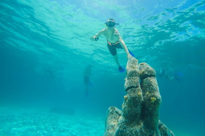 Half Day Sailing Private Catamaran to Isla Mujeres - Weather, cancellation, and practical planning