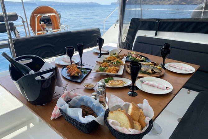 Half-Day Tailor-made Private Catamaran Cruise in Santorini - Oia and the old harbor from the sea