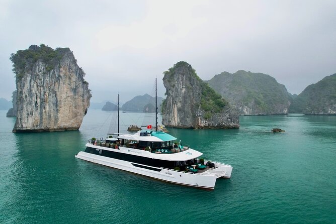 Halong Catamaran Cruise - Halong Bay Lan Ha Luxury Day Trip - Boarding the catamaran in Ha Long Bay