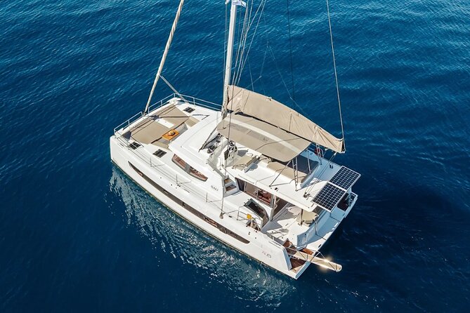 Hersonissos: Luxury Sunset Catamaran Cruise Sushi & Open Bar - Sailing from Hersonissos toward Saint George Bay