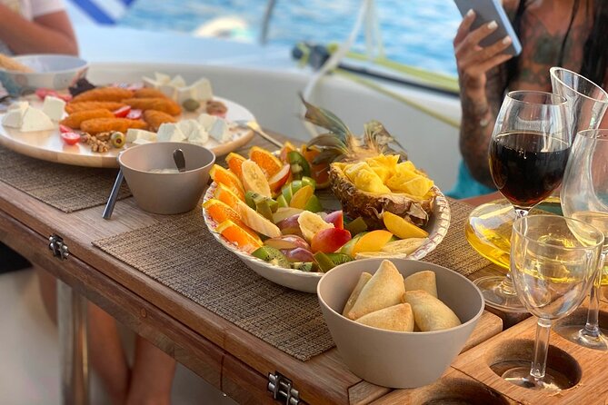 Hersonissos: Luxury Sunset Catamaran Cruise Sushi & Open Bar - Seasickness, weather, and family considerations