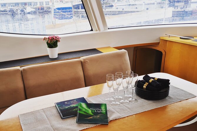 History Fjordcruise Around The Isle Of Tromso - Luxury Catamaran - Warm drinks, snacks, and a heated cabin