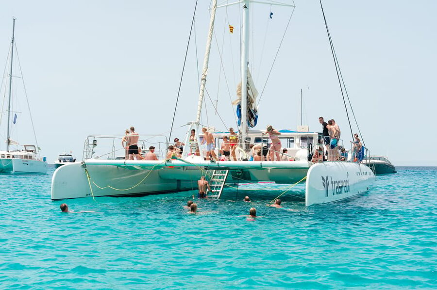 Ibiza: Catamaran Cruise to Formentera with Meal and Drinks - Two hours near Playa de Ses Illetes